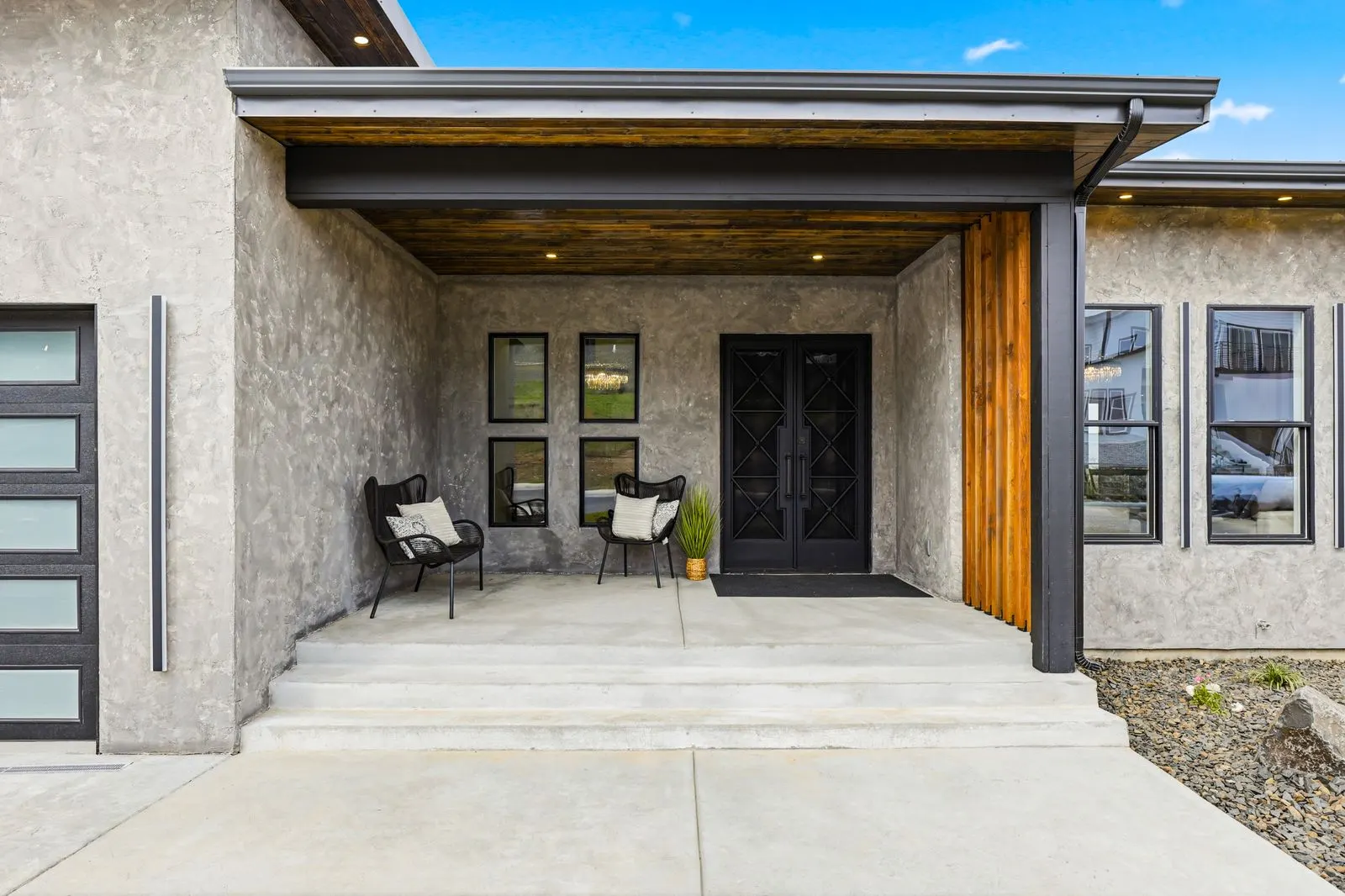 Custom iron doors with cedar accent at 1301 2nd Street